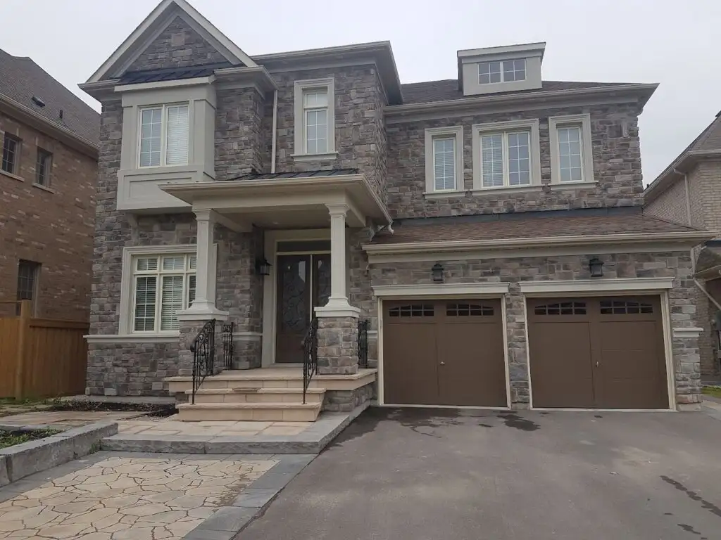 Stone veneer installation Toronto — exterior cladding by Alasya Construction