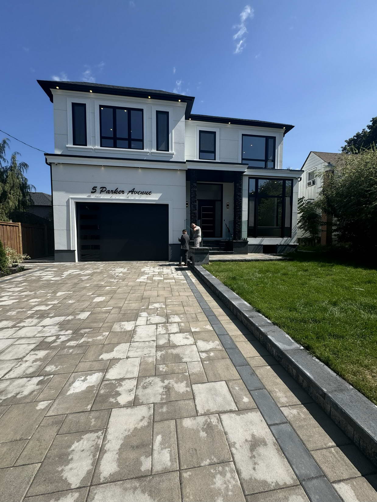 Exterior stucco transformation on Toronto home — before and after residential project by Alasya Construction